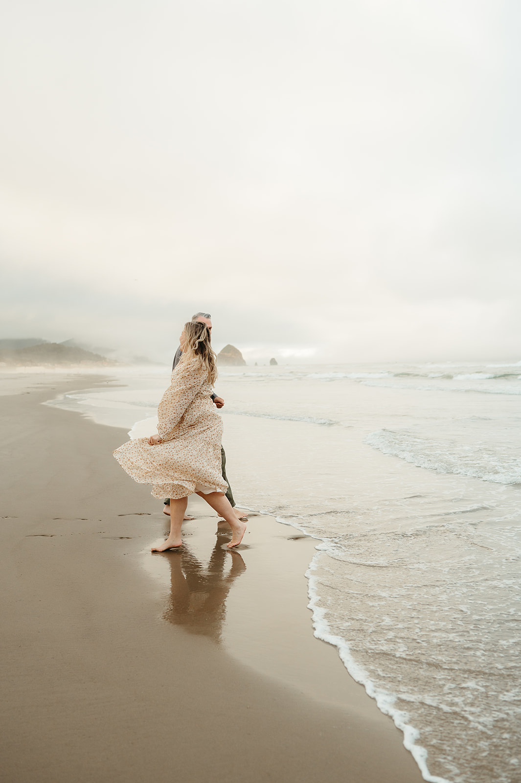 portland family playing at the oregon coast