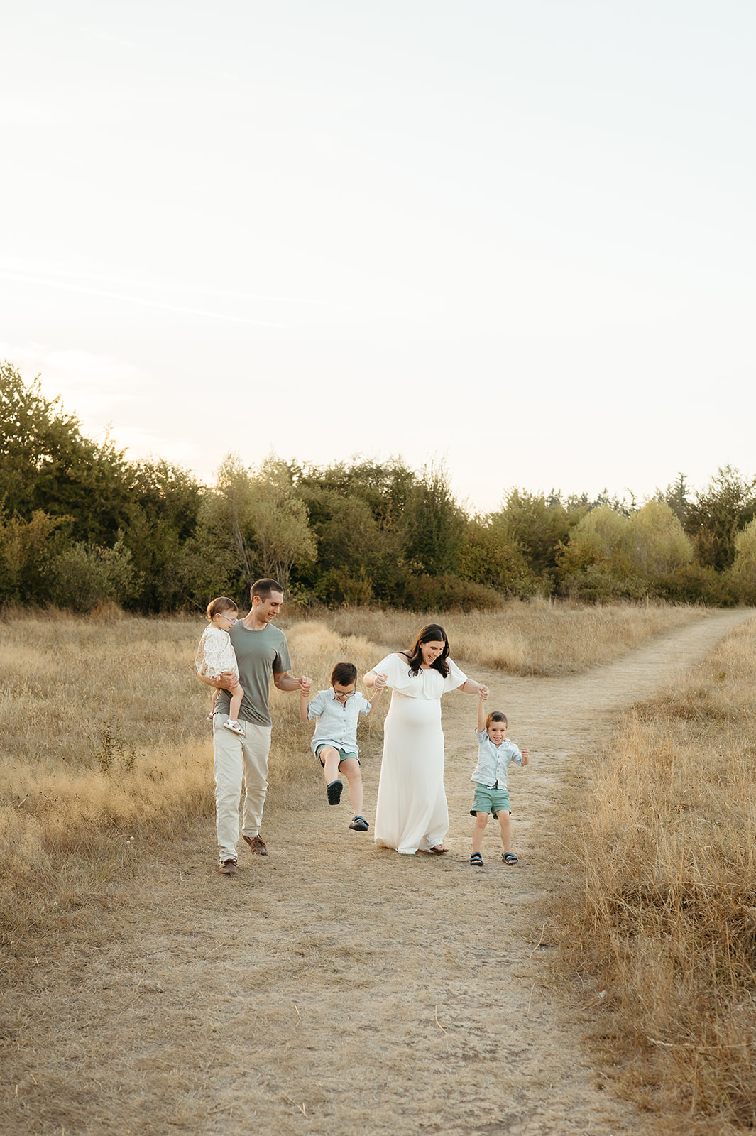 portland family photos summer family playing in a field